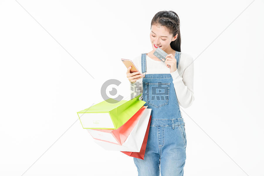 年轻女性购物手机移动支付图片素材免费下载