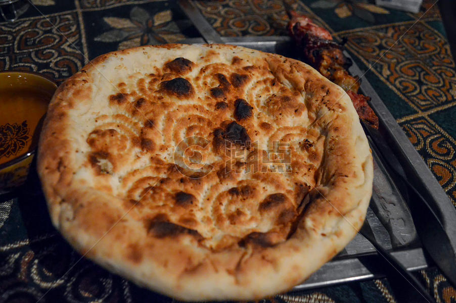 新疆特色小吃烤馕图片素材免费下载
