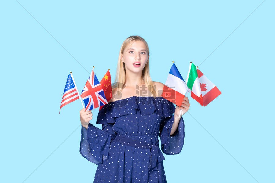 留学生拿国旗形象图片素材免费下载