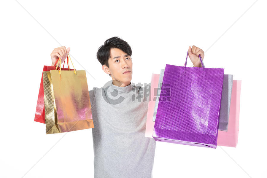 手提购物袋男性思考形象图片素材免费下载
