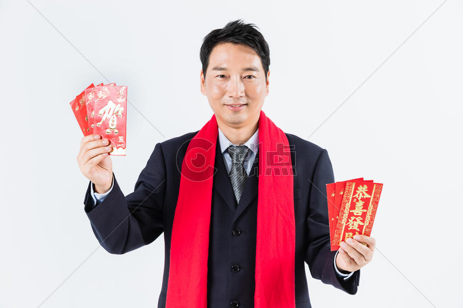新春商务男性手拿红包图片素材免费下载