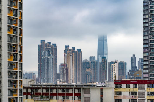 乌云密布下香港民居楼房图片素材免费下载