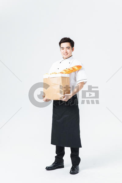 西餐厨师拿着面包图片素材免费下载