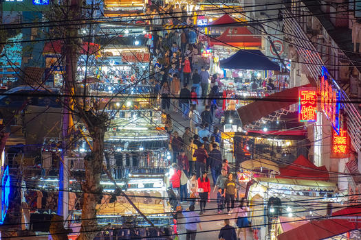 城市夜晚喧嚣的夜市商贩人群图片素材免费下载