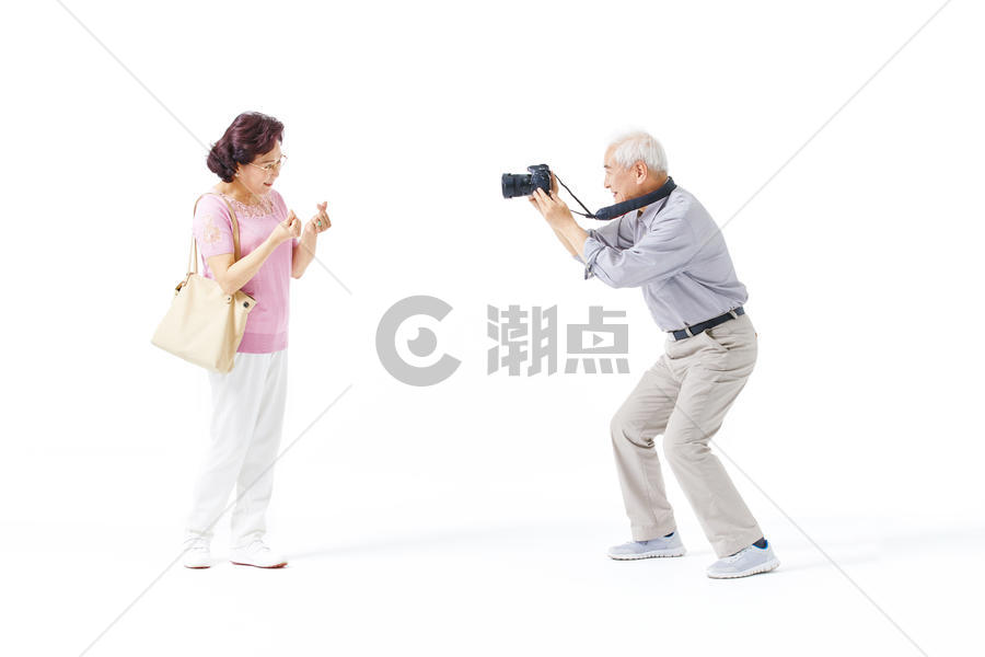 老年夫妇拍照图片素材免费下载