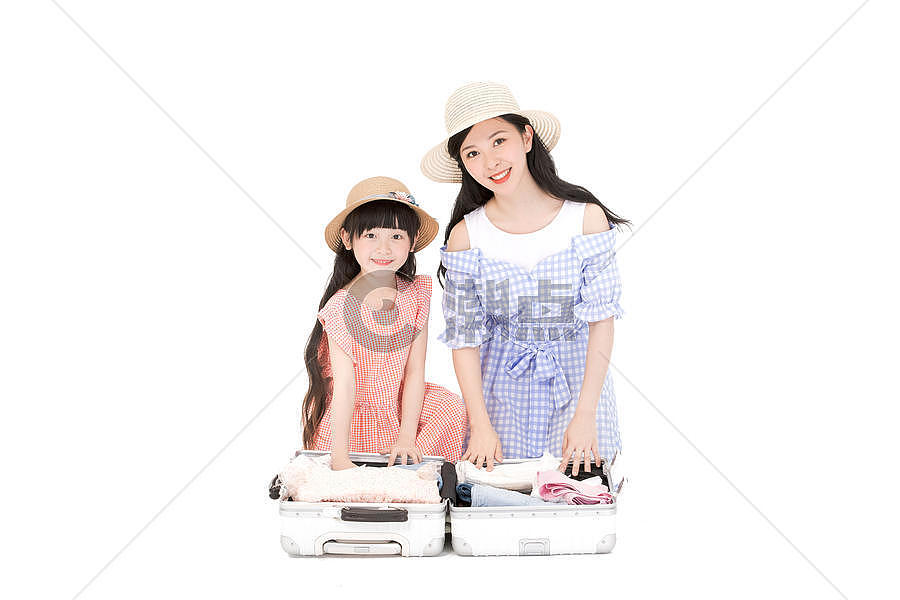 母女整理行李箱图片素材免费下载