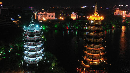 4k高清航拍桂林旅游著名景点日月双塔古建筑夜景视频的预览图