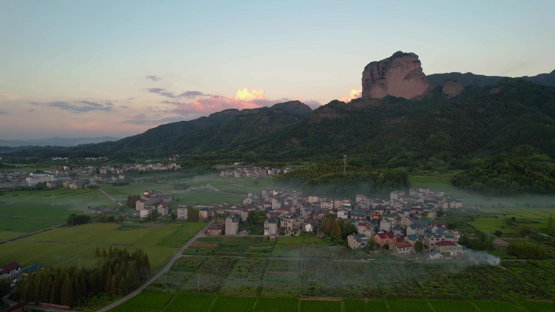 航拍5A浙江衢州江郎山与日落下的村落视频视频的预览图