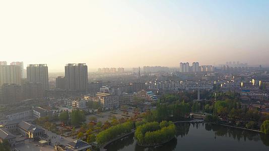 航拍江苏淮安日出清晨城市风光视频视频的预览图