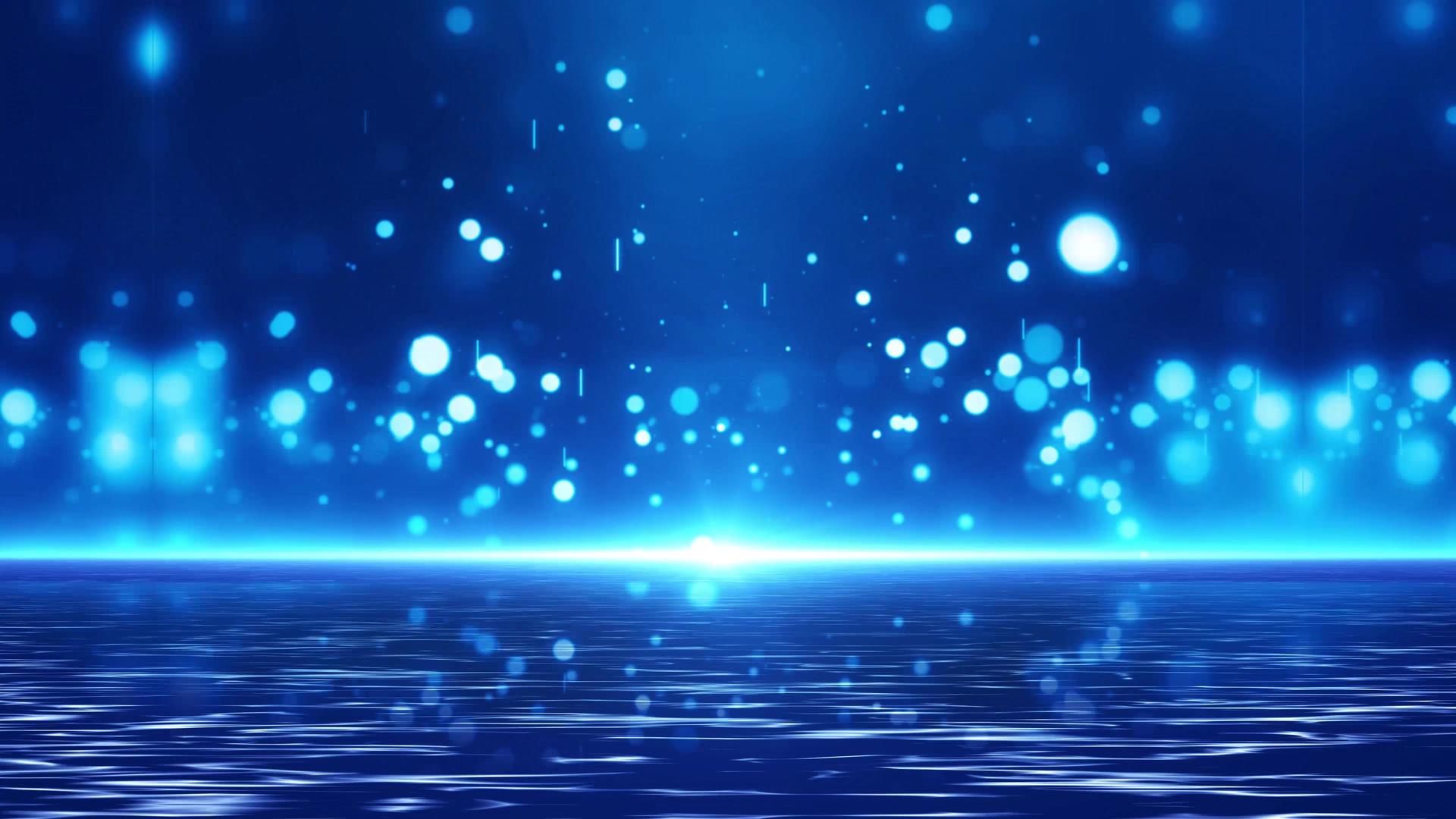 4k梦幻蓝色粒子舞台背景视频的预览图