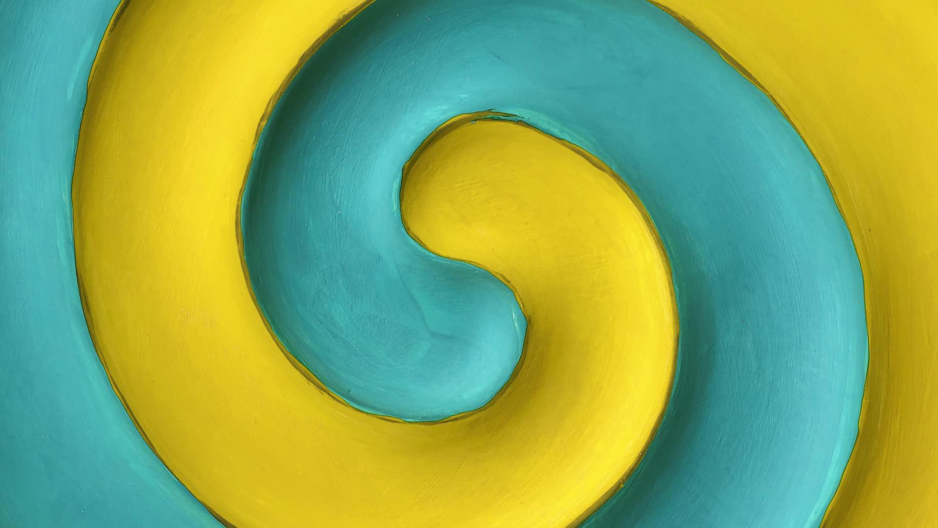 黄色和蓝绿色螺旋旋转视频的预览图
