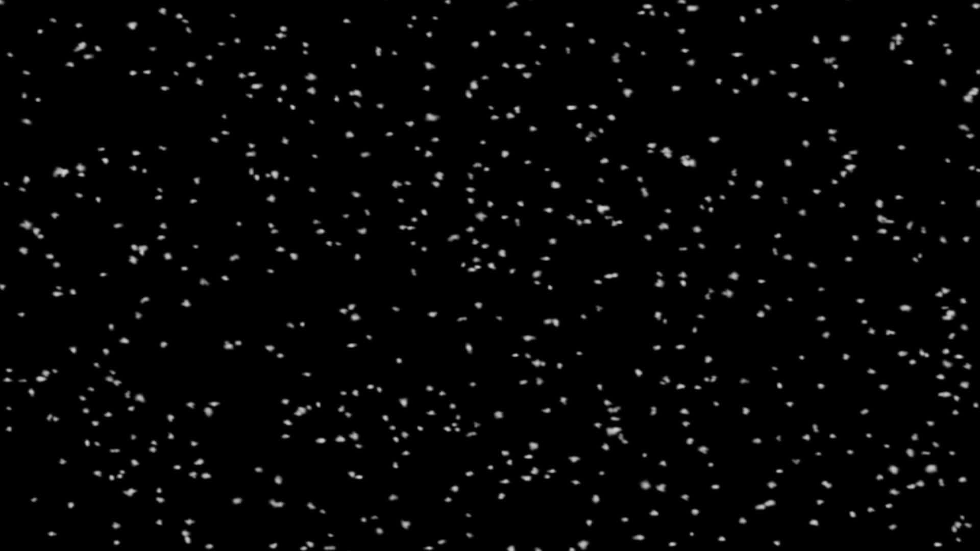 黑色背景的雪球从上面落下视频的预览图