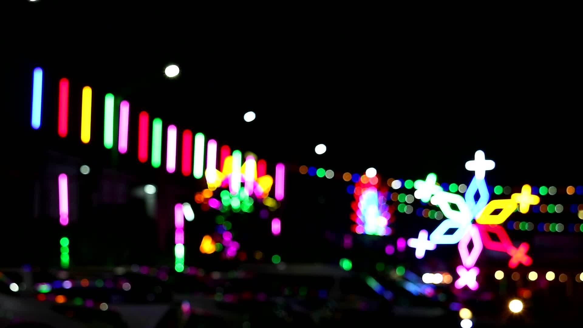 夜市博览会停车场的晚轮灯视频的预览图