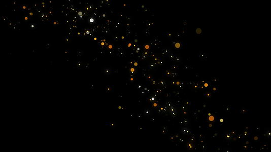 亮光和无焦点圆金粒子在黑色背景4k上散射四千视频的预览图