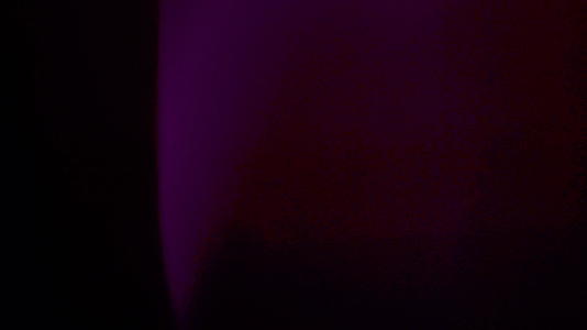 黑色背景上的抽象光和照明弹视频的预览图