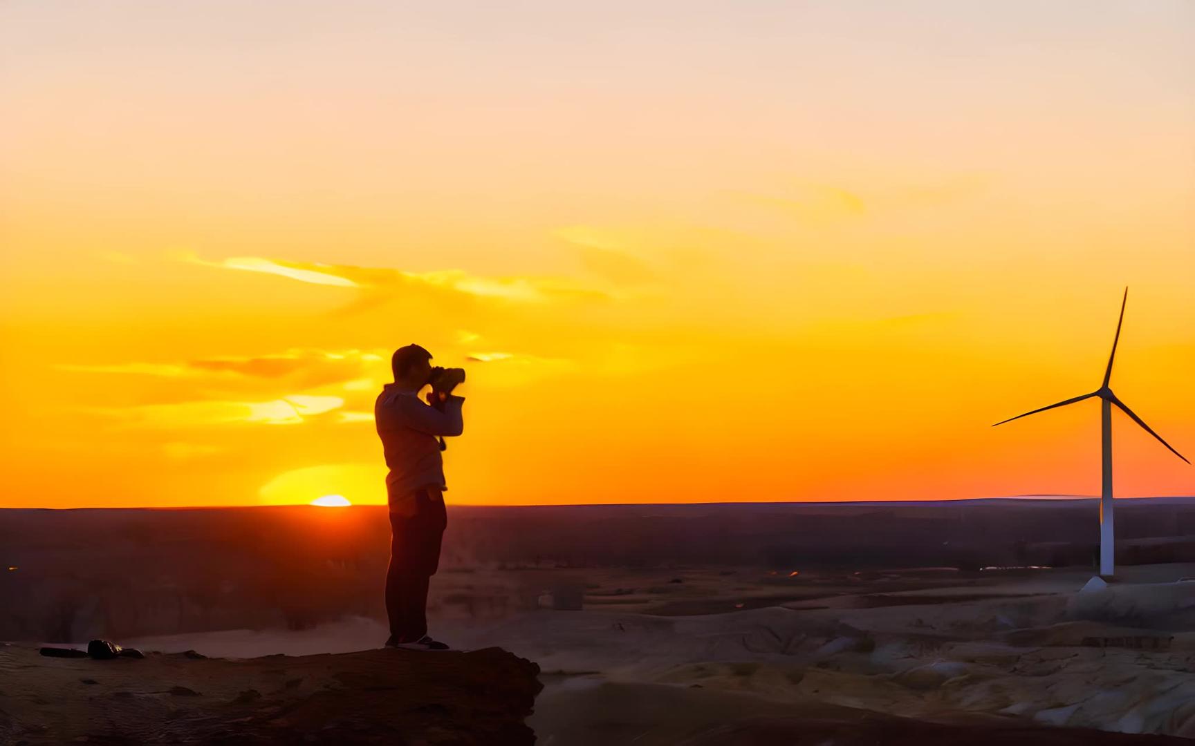 摄影师在新疆克拉玛依草原上视频的预览图