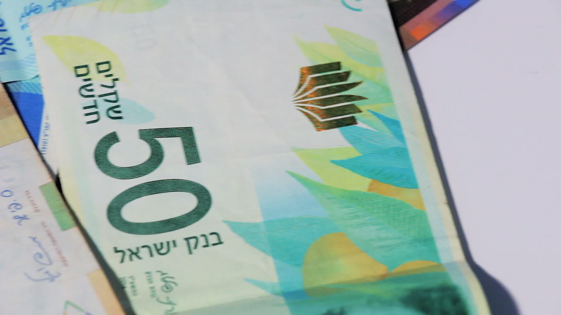 各种Israeli堆叠谢克尔钞票视频的预览图