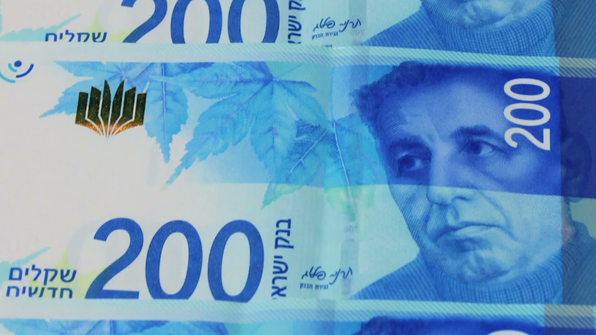 二百谢克尔的Israeli货币账单向上倾斜视频的预览图