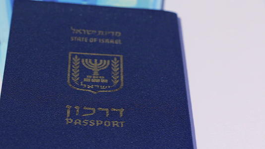 200谢克尔和Israeli护照左面纸视频的预览图