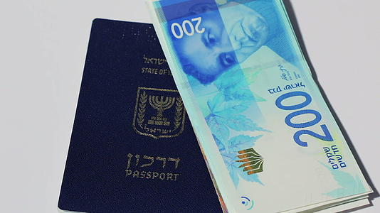 200谢克尔和Israeli护照左面纸视频的预览图