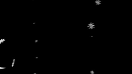 黑色背景的纹理雪花飞得很快视频的预览图
