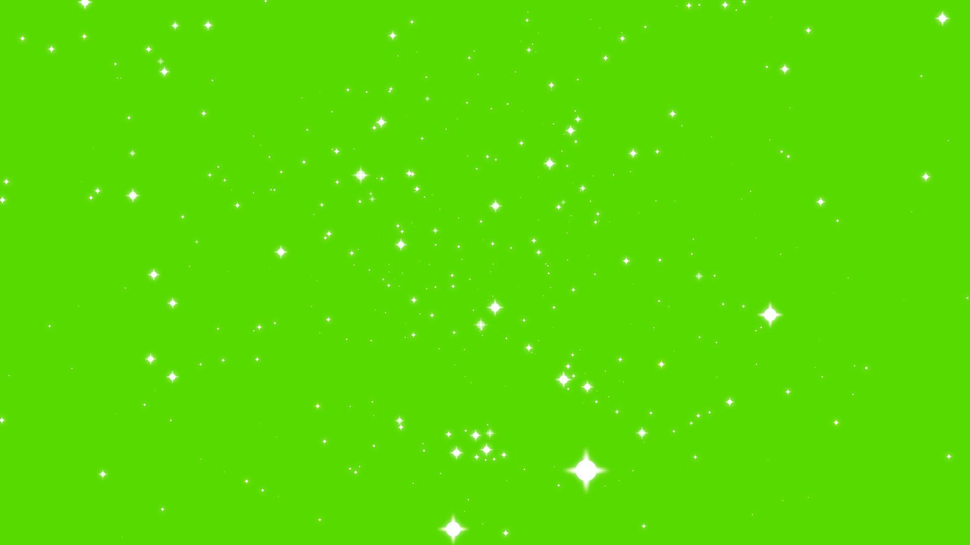 绿色屏幕背景淡化了绿色屏幕背景中缓慢闪烁的粒子视频的预览图