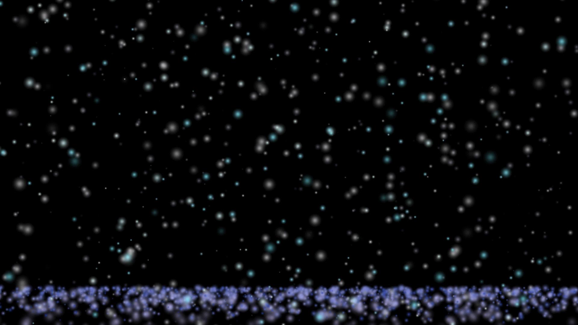 蓝色的雪在黑屏上漂浮在空中视频的预览图