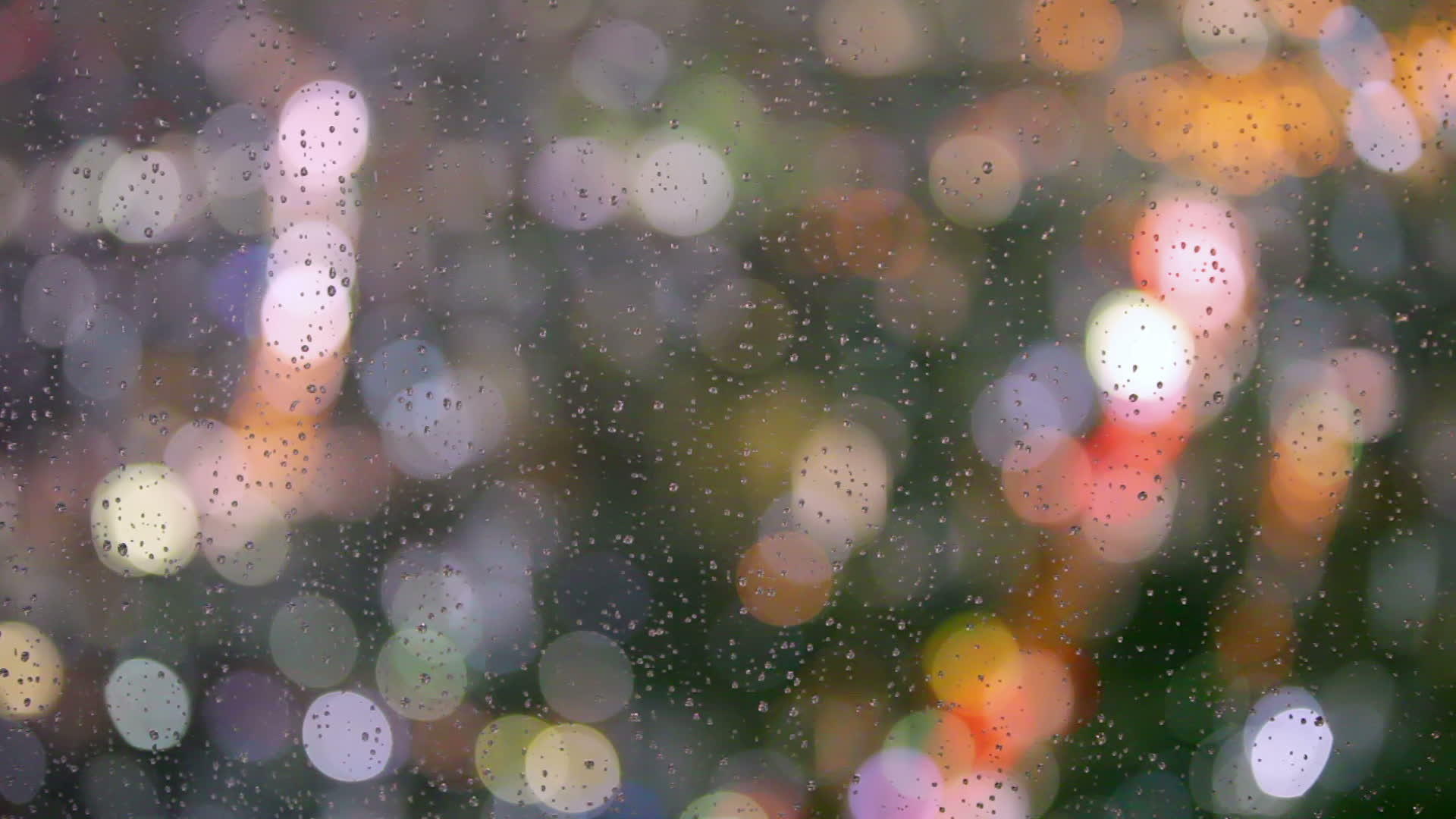 窗户上有雨滴街上有雨滴bokeh的灯光视频的预览图