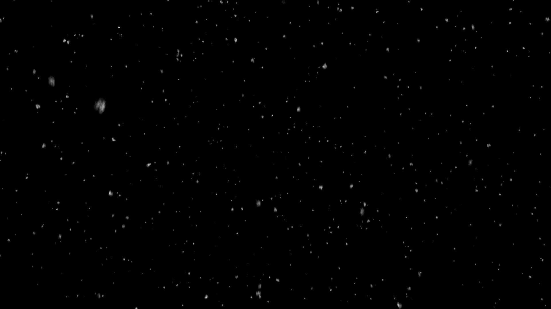 雪落在黑底灰灰色的小颗粒上视频的预览图