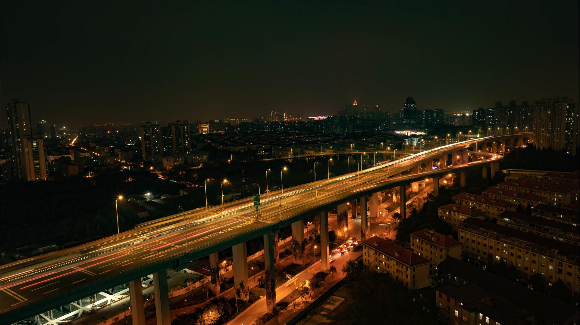 8k大城市立交桥车流光线楼房小区夜景文艺效果延时摄影视频的预览图