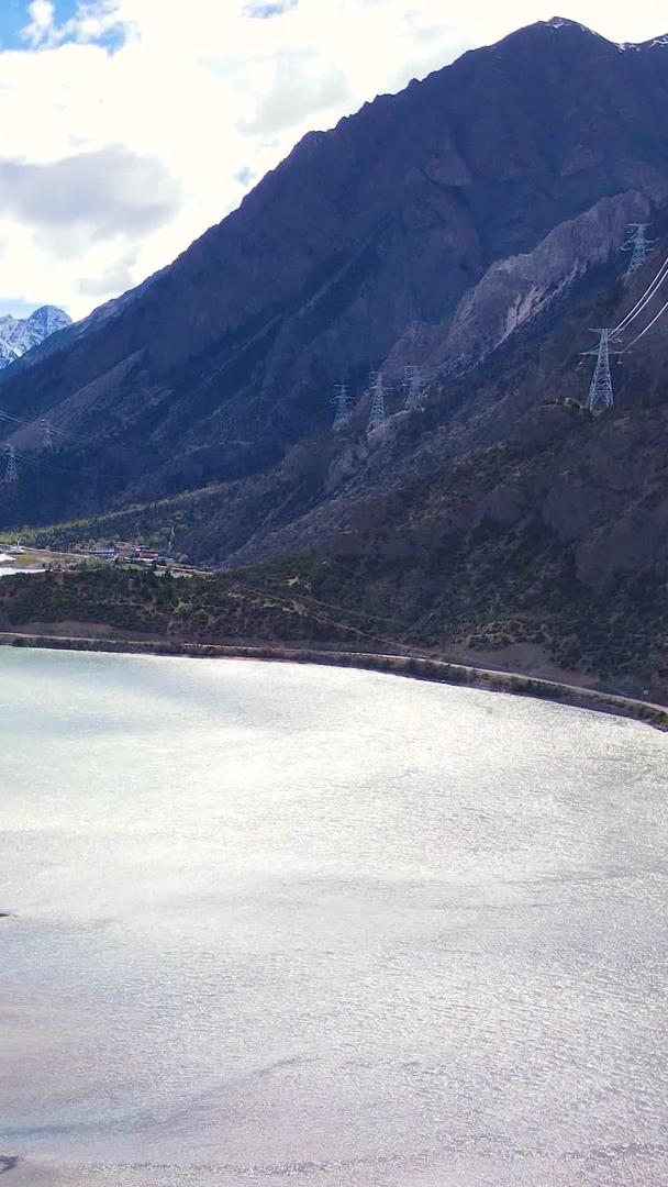 航拍八宿雪山下的然乌湖旅游景点视频的预览图