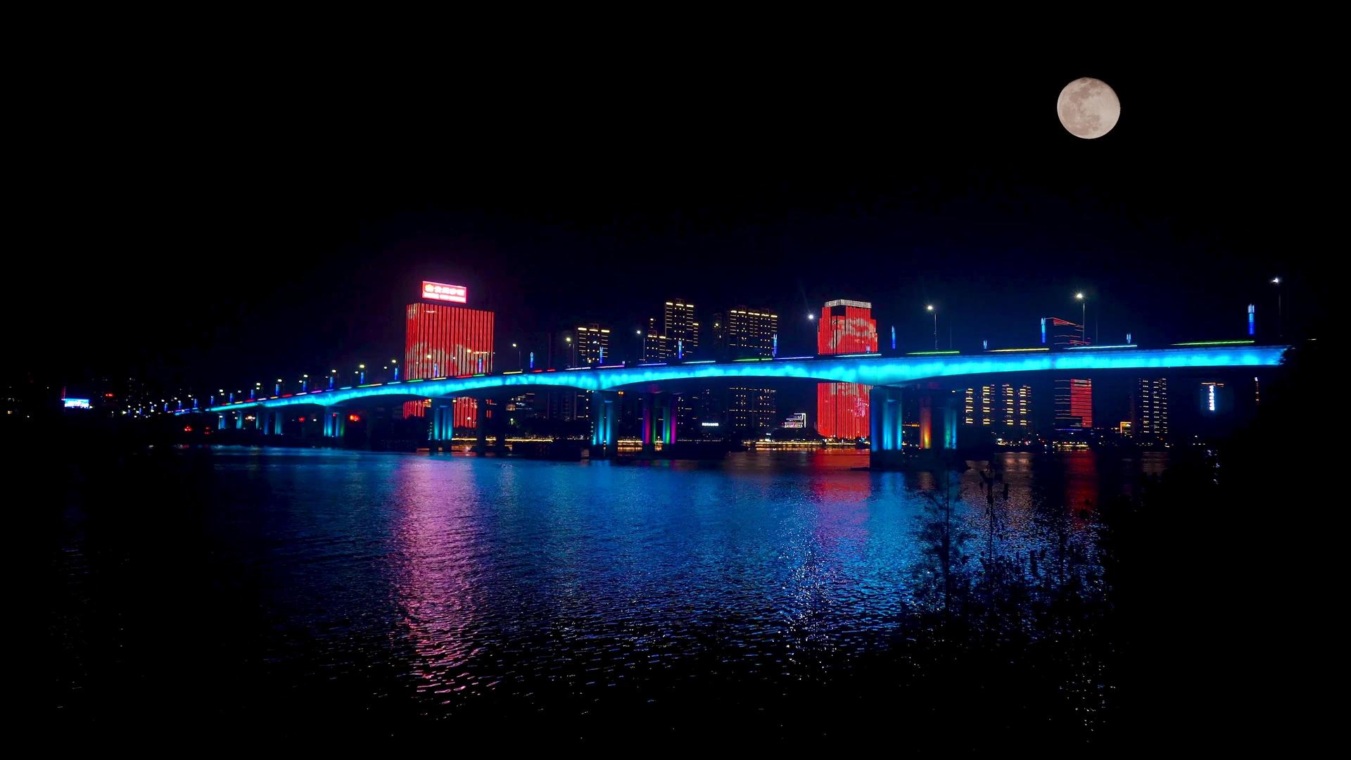 城市五彩江景夜景视频的预览图