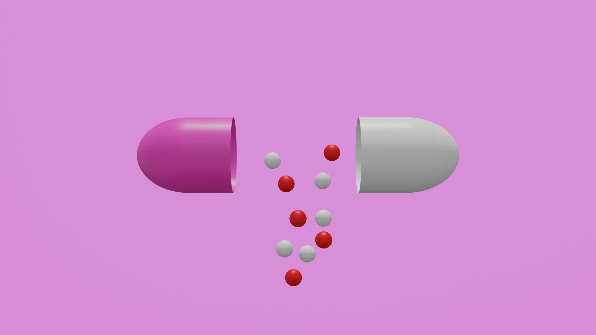 粉红色和白色胶囊含有短暂释放的药物视频的预览图