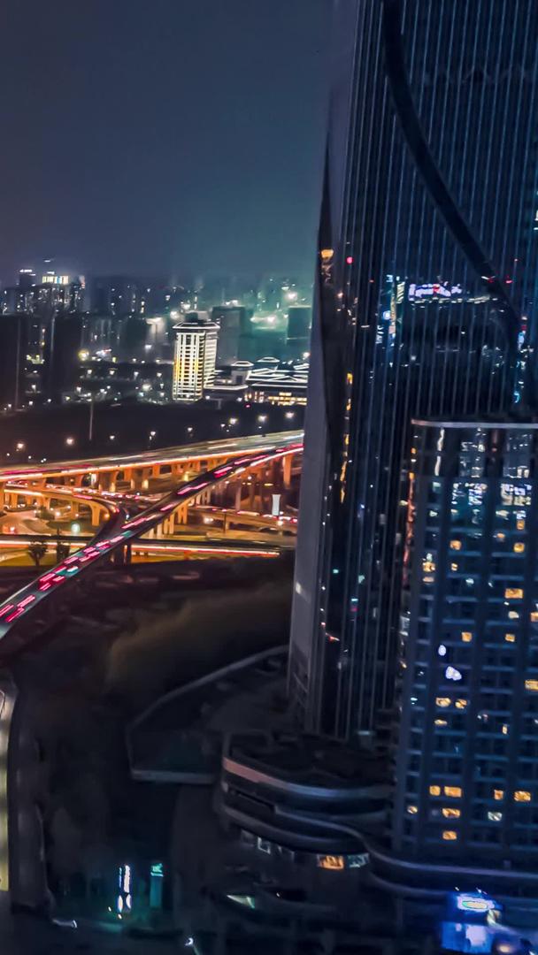 航拍震撼大范围移动延时杭州天际线城市夜景智慧之门大厦立交枢纽视频的预览图
