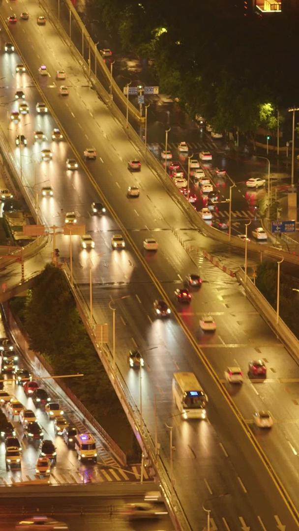集航拍城市雨天交通桥梁道路灯光川流不息的交通街景灯光秀素材视频的预览图
