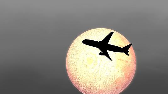 飞机在月亮的夜晚飞行视频的预览图
