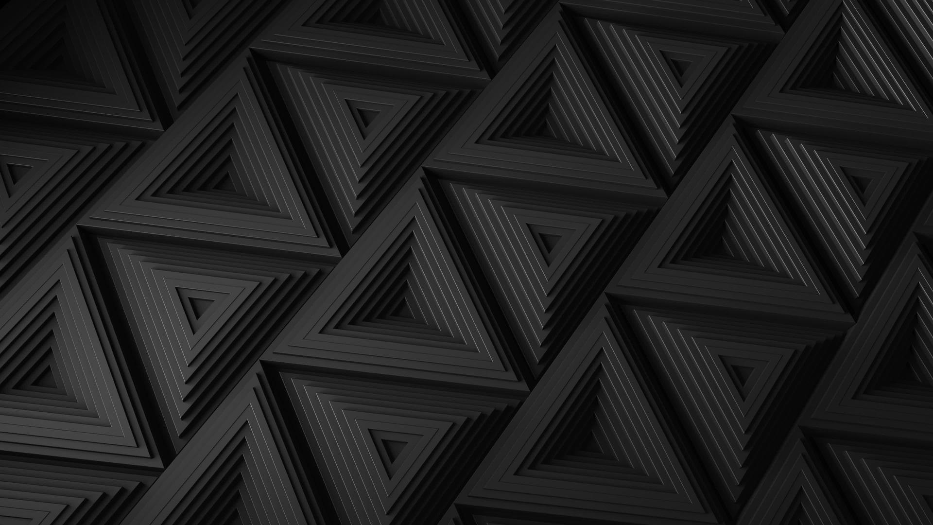 带有移动黑色三角形马赛克表面的黑色极简主义视频的预览图