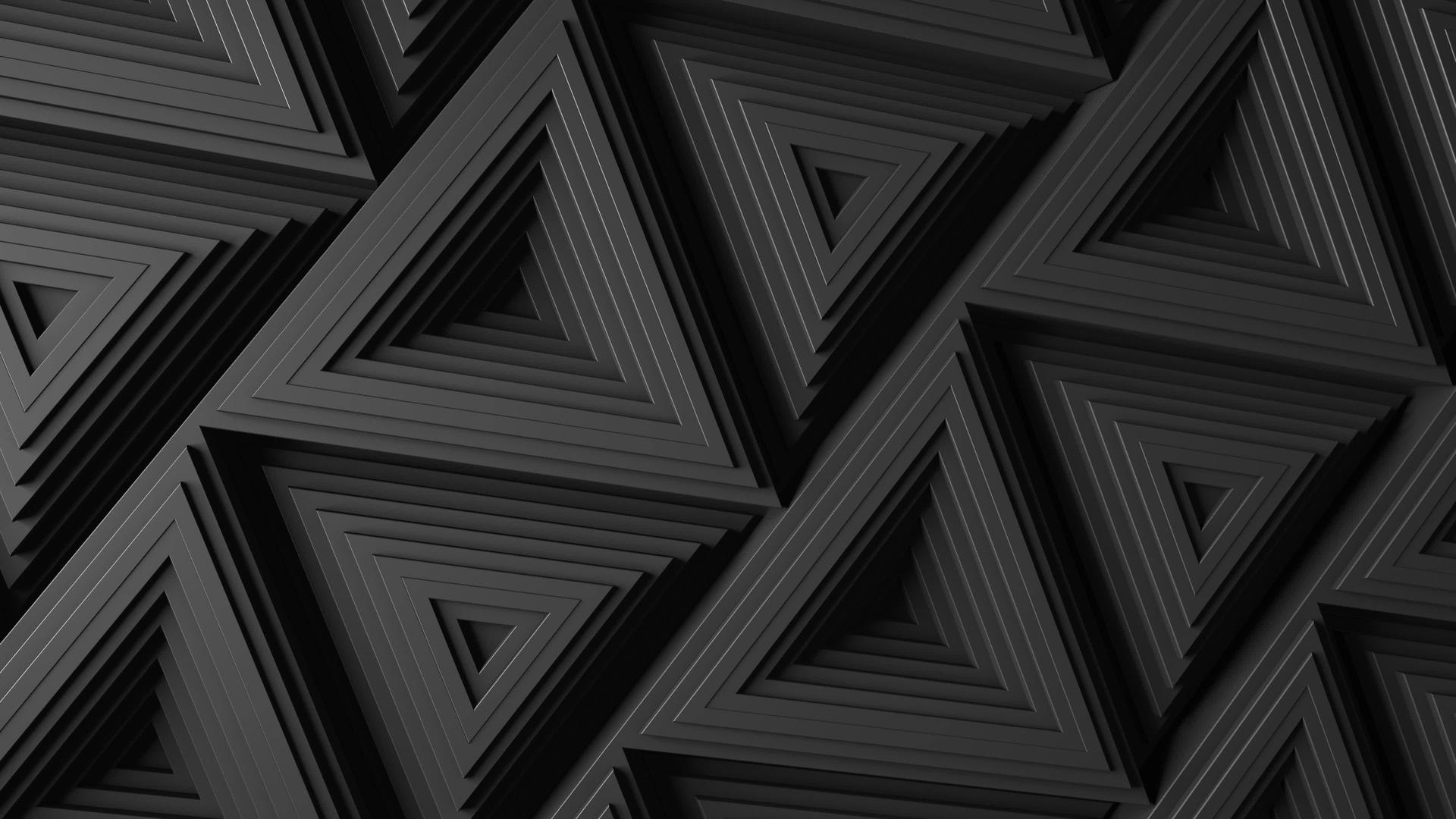 带有移动黑色三角形马赛克表面的黑色极简主义视频的预览图