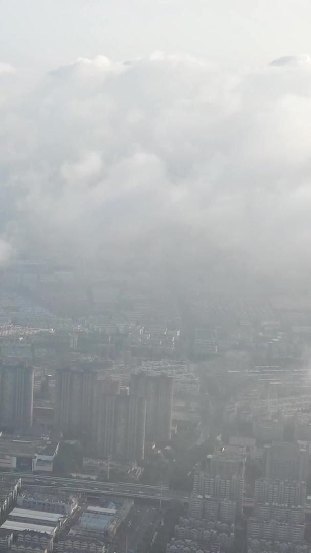 清晨南京城市建筑群CBD薄雾航拍视频的预览图