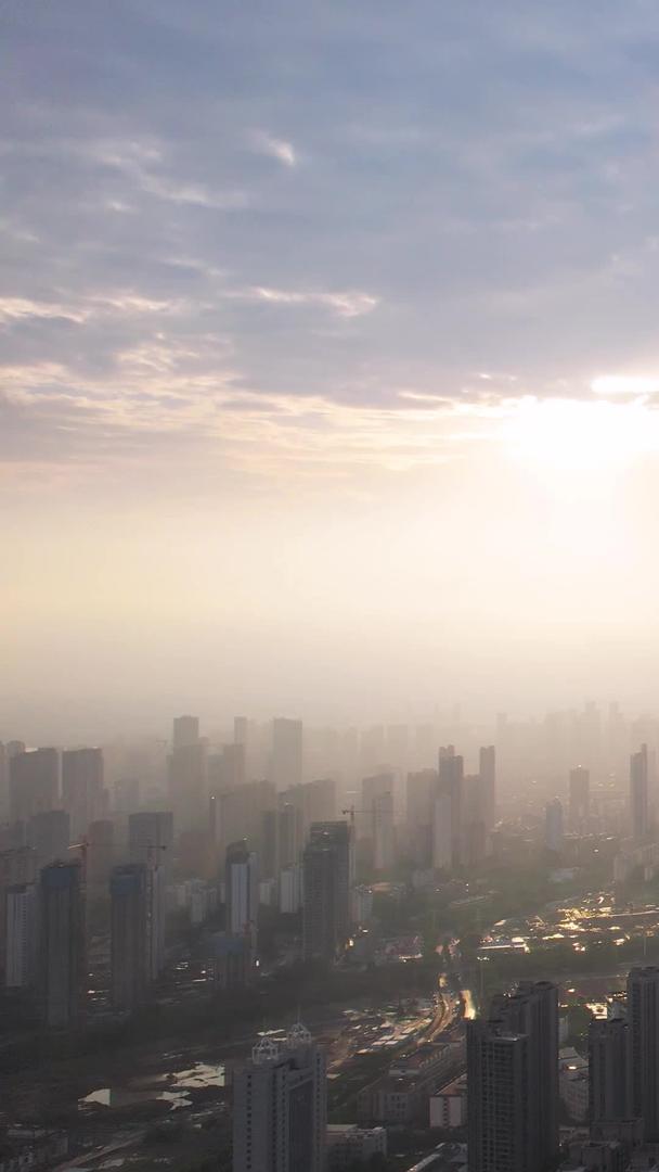 航拍城市蓝天白云晴天落日阳光江景天际线高楼街景素材视频的预览图