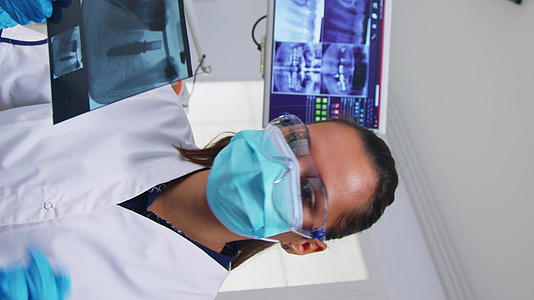 垂直视频牙科办公室规划外科手术的患者第一视角X光检查视频的预览图