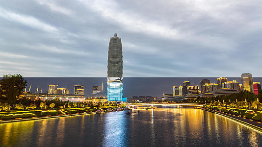 8k延时河南郑州如意湖玉米大楼日转夜素材视频的预览图