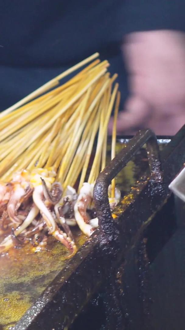 城市美食街餐饮铁板鱿鱼素材视频的预览图