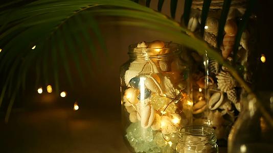 用于家居装饰的热带贝壳玻璃罐用于海滩主题室内装饰视频的预览图