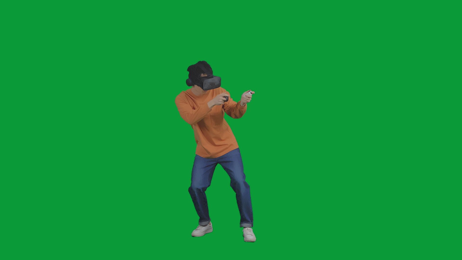 4K绿幕男青年使用VR设备玩射击游戏视频的预览图