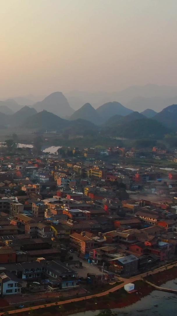 云南著名的5A旅游景点普者黑景区被峰林包围的普者黑村视频视频的预览图
