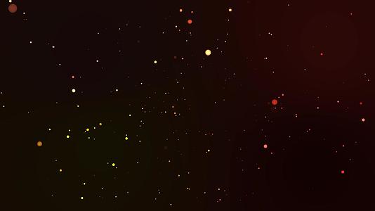 闪闪发光的颗粒是缓慢的圆形和深红色的背景色视频的预览图