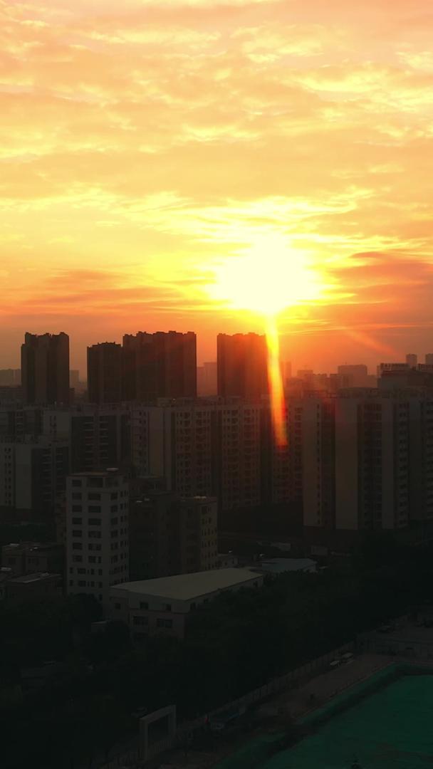 航拍城市剪影夕阳火烧云视频素材视频的预览图