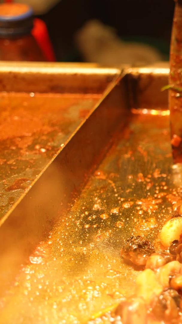 城市宵夜美食特色中式小吃铁板麻辣螺丝鱿鱼制作工艺素材视频的预览图