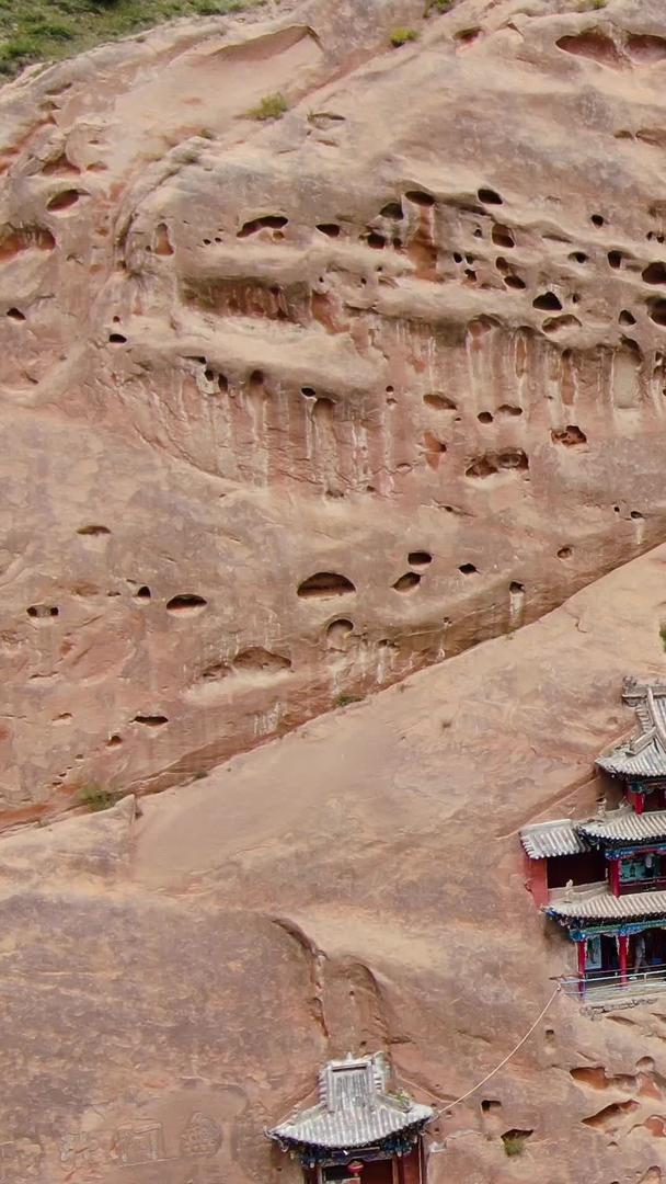 甘肃马蹄寺5A景区航拍凿岩壁上的悬空寺视频集合视频的预览图